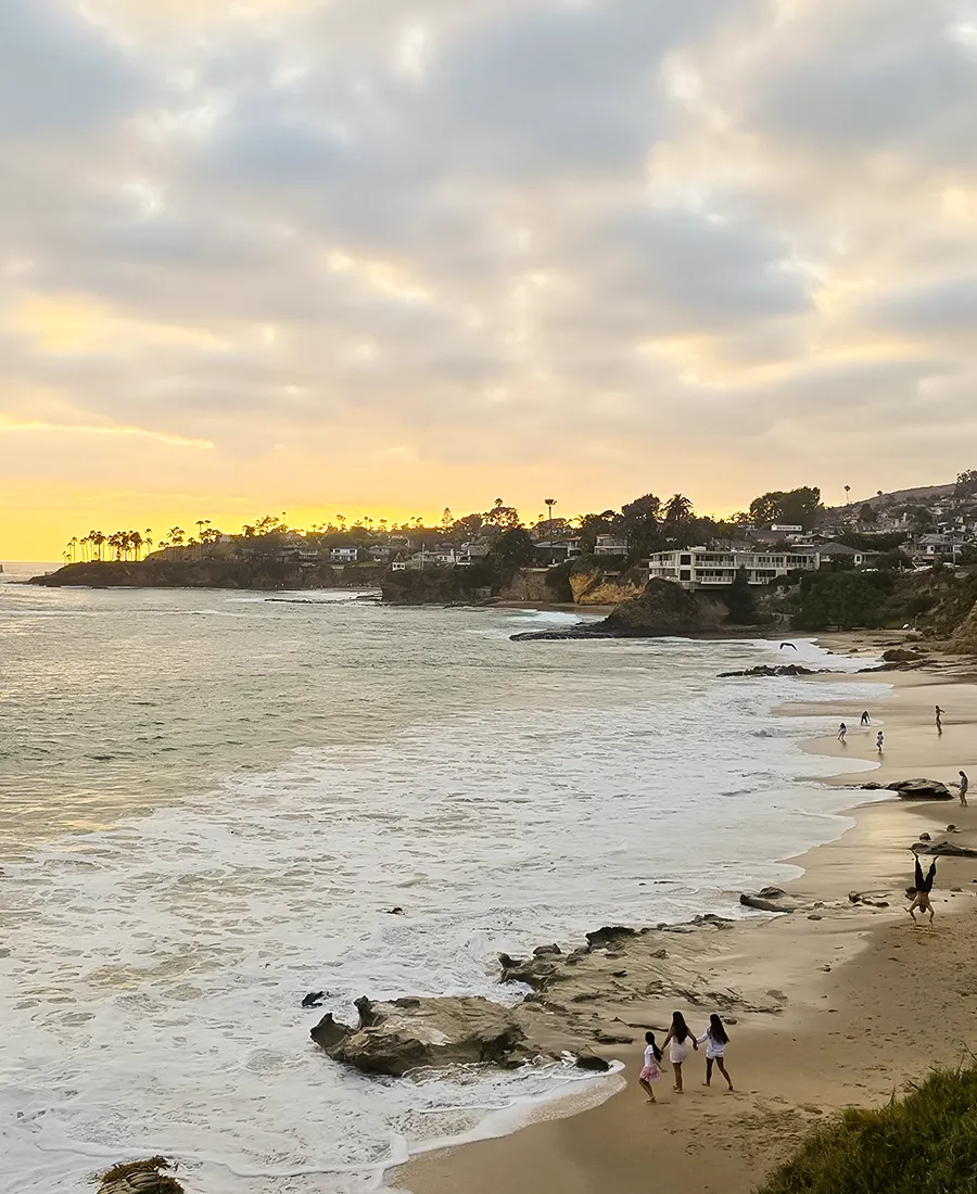 Sunset over the beach and coastal cliffs